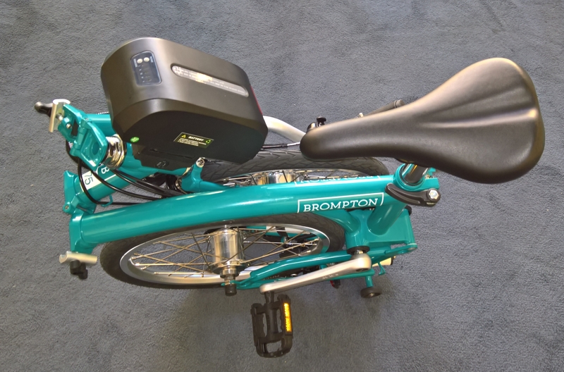 Электровелосипед Woosh. Brompton Electric Kit. Прокатный электровелосипед Woosh. Мотор для Бромптон.
